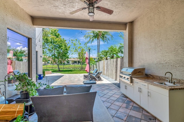 8979 Little Falls Way, Delray Beach, FL 33446 - fenced backyard with a sink, a patio, and a ceiling fan