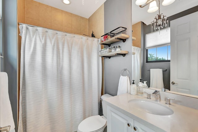 8979 Little Falls Way, Delray Beach, FL 33446 - bathroom with a chandelier, toilet, vanity, and curtained shower