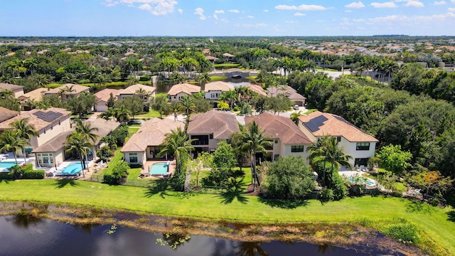 8979 Little Falls Way, Delray Beach, FL 33446 - aerial view of residential area featuring a large body of water, a pool, and a tree filled landscape
