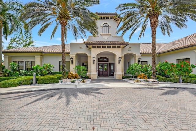 8979 Little Falls Way, Delray Beach, FL 33446 - view of front of house with stucco siding, french doors, and a tiled roof