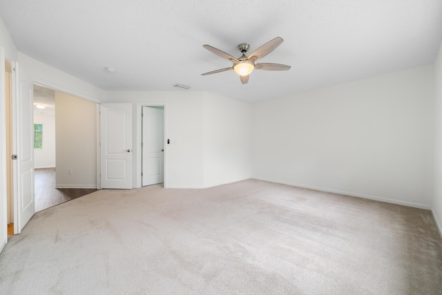 4718 NW 59th Mnr, Coconut Creek, FL 33073 - carpeted empty room featuring a ceiling fan and baseboards