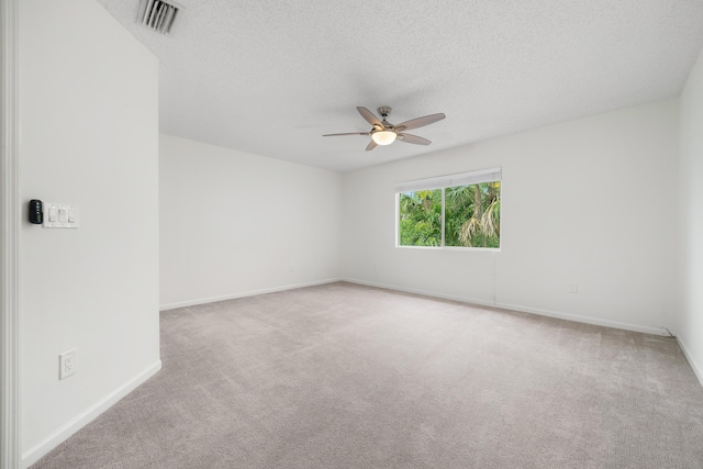 4718 NW 59th Mnr, Coconut Creek, FL 33073 - carpeted spare room featuring a ceiling fan, baseboards, and a textured ceiling