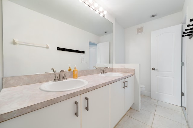4718 NW 59th Mnr, Coconut Creek, FL 33073 - full bathroom featuring double vanity, marble finish flooring, and toilet