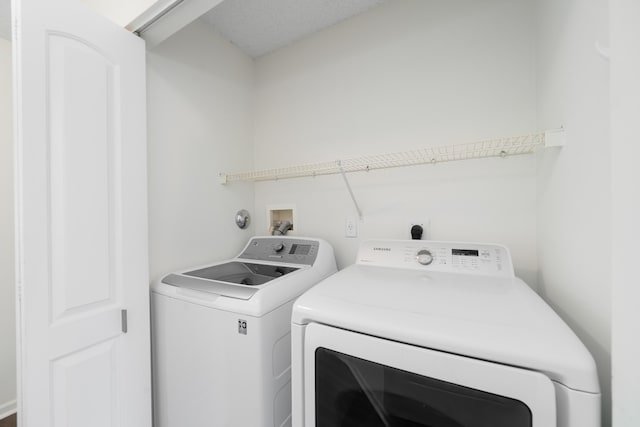 4718 NW 59th Mnr, Coconut Creek, FL 33073 - laundry room featuring washer and dryer