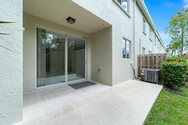 4718 NW 59th Mnr, Coconut Creek, FL 33073 - view of patio featuring central AC and fence