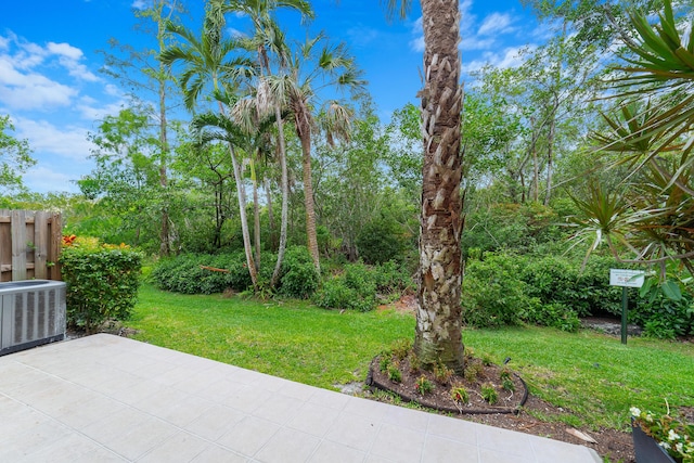 4718 NW 59th Mnr, Coconut Creek, FL 33073 - view of yard featuring a patio and cooling unit