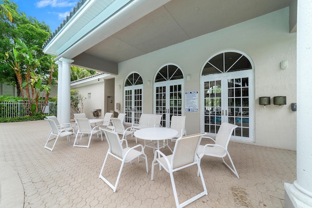 4718 NW 59th Mnr, Coconut Creek, FL 33073 - view of patio with french doors and fence