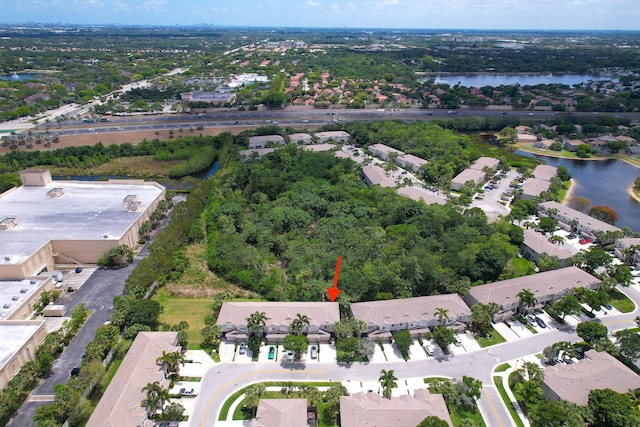 4718 NW 59th Mnr, Coconut Creek, FL 33073 - aerial view of property's location with a nearby body of water and nearby suburban area