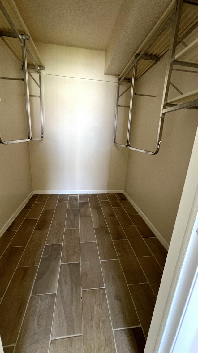 4345 Trevi Ct Unit 208, Lake Worth, FL 33467 - walk in closet featuring wood finish floors