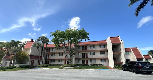 4345 Trevi Ct Unit 208, Lake Worth, FL 33467 - view of apartment building / complex with uncovered parking
