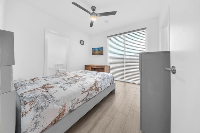 bedroom with light wood-style floors and ceiling fan