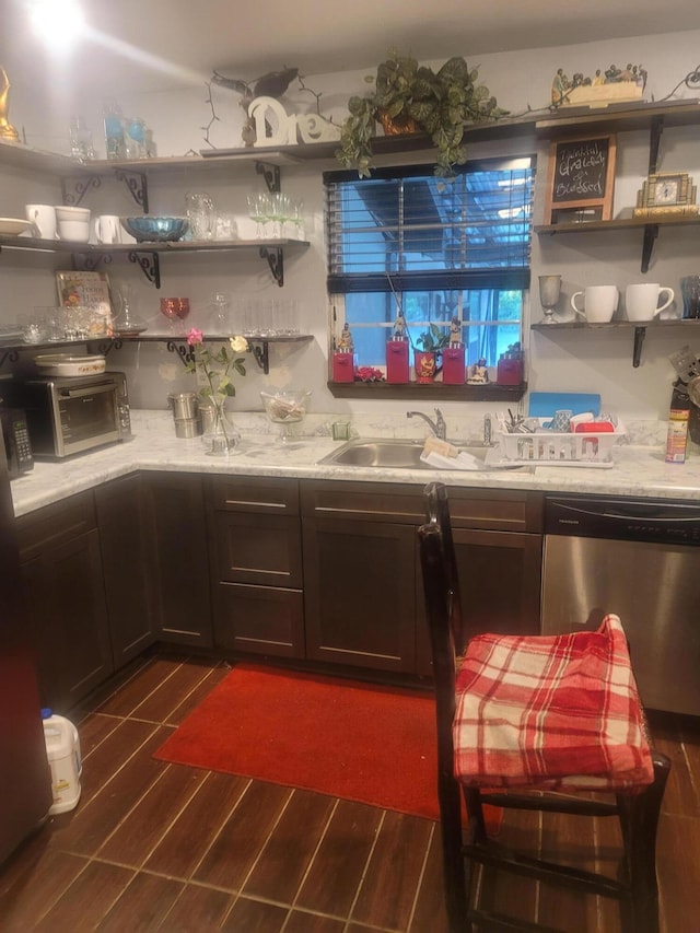 4832 Flynt Dr, Marianna, FL 32446 - kitchen with dishwasher, open shelves, a sink, dark wood-type flooring, and light countertops