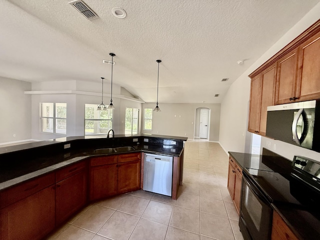 1744 SW Nantucket Ave, Port Saint Lucie, FL 34953 - kitchen with stainless steel appliances, a sink, arched walkways, open floor plan, and light tile patterned floors