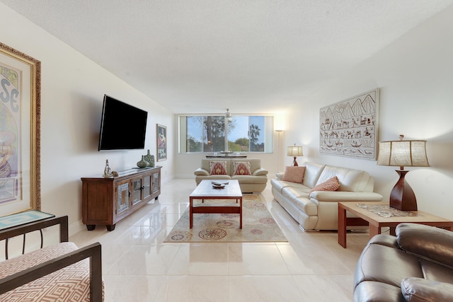 6698 10th Ave N Unit 320, Lake Worth, FL 33467 - living room featuring baseboards