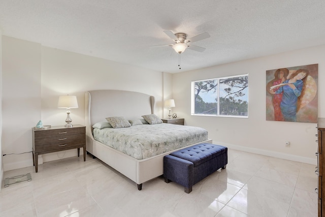 6698 10th Ave N Unit 320, Lake Worth, FL 33467 - bedroom featuring baseboards, ceiling fan, and a textured ceiling