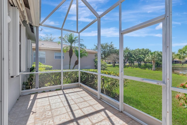 9564 Crescent View Dr N, Boynton Beach, FL 33437 - unfurnished sunroom with a water view