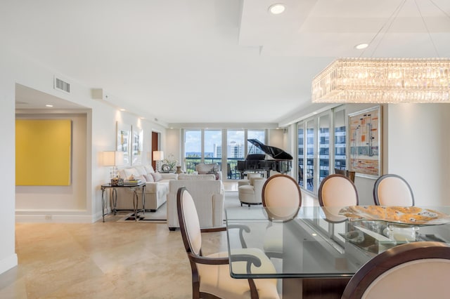 901 E Camino Real Unit 7C, Boca Raton, FL 33432 - dining room featuring a chandelier, recessed lighting, and baseboards