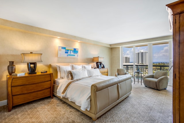 901 E Camino Real Unit 7C, Boca Raton, FL 33432 - bedroom featuring access to exterior