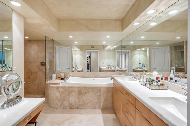 901 E Camino Real Unit 7C, Boca Raton, FL 33432 - full bath featuring a bath, a tile shower, recessed lighting, double vanity, and tile patterned flooring