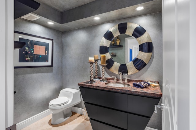 901 E Camino Real Unit 7C, Boca Raton, FL 33432 - bathroom with toilet, vanity, baseboards, and recessed lighting