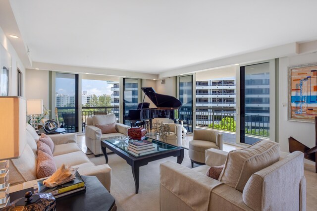 901 E Camino Real Unit 7C, Boca Raton, FL 33432 - living room with a city view and a wall of windows