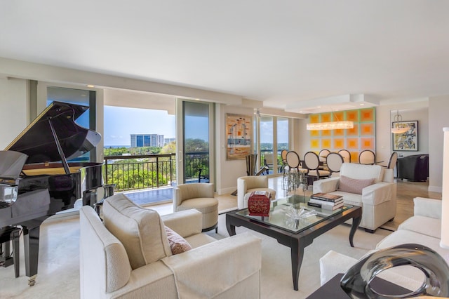 901 E Camino Real Unit 7C, Boca Raton, FL 33432 - living room featuring baseboards