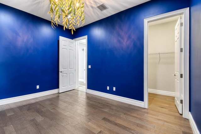 16323 Pantheon Pass, Delray Beach, FL 33446 - empty room with wood finished floors and baseboards