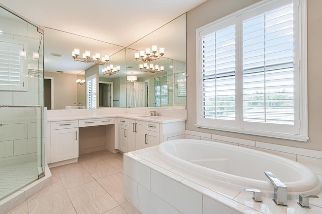 16323 Pantheon Pass, Delray Beach, FL 33446 - full bathroom featuring a bath, a chandelier, vanity, a stall shower, and tile patterned floors