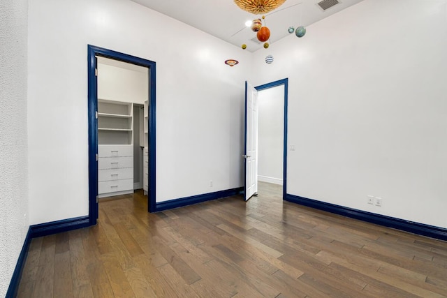 16323 Pantheon Pass, Delray Beach, FL 33446 - empty room with hardwood / wood-style floors and baseboards