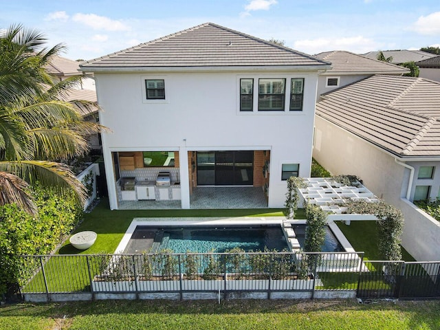 16323 Pantheon Pass, Delray Beach, FL 33446 - back of house with exterior kitchen, a tiled roof, stucco siding, and a patio