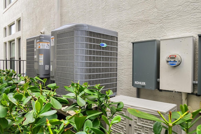 16323 Pantheon Pass, Delray Beach, FL 33446 - exterior view of stucco siding, central AC, and electric meter