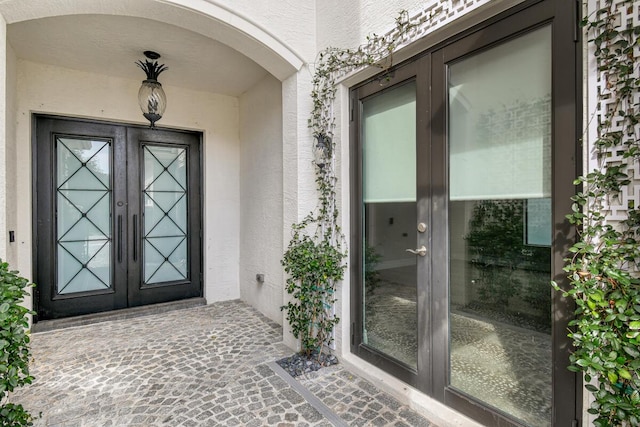 16323 Pantheon Pass, Delray Beach, FL 33446 - doorway to property featuring french doors and stucco siding