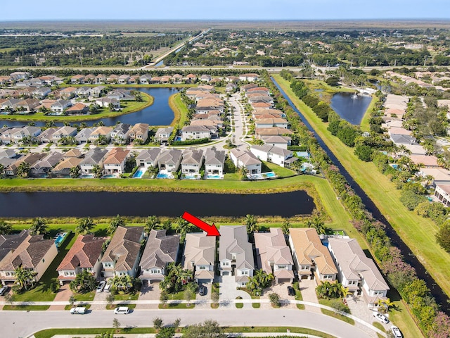 16323 Pantheon Pass, Delray Beach, FL 33446 - aerial overview of property's location with nearby suburban area and a large body of water