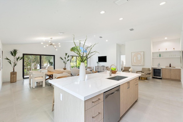 1175 Sea Grape Cir, Delray Beach, FL 33445 - kitchen with a sink, open floor plan, modern cabinets, wine cooler, and light brown cabinetry