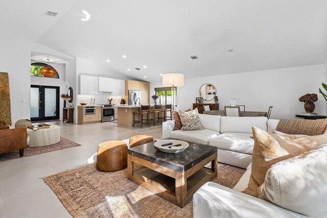 1175 Sea Grape Cir, Delray Beach, FL 33445 - living area featuring high vaulted ceiling and recessed lighting