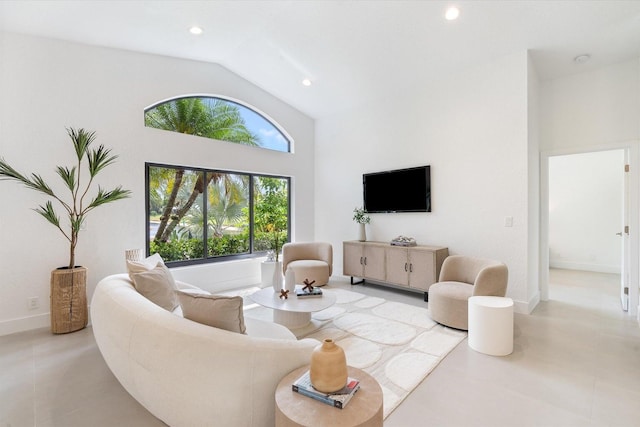 1175 Sea Grape Cir, Delray Beach, FL 33445 - living area with recessed lighting, baseboards, and high vaulted ceiling