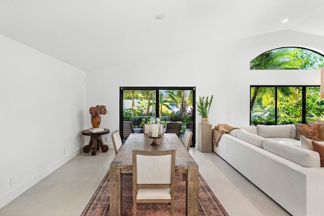 1175 Sea Grape Cir, Delray Beach, FL 33445 - dining room with vaulted ceiling, plenty of natural light, baseboards, and recessed lighting