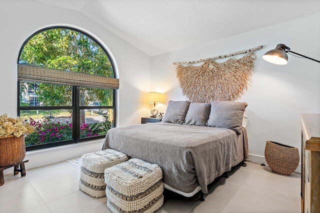 1175 Sea Grape Cir, Delray Beach, FL 33445 - tiled bedroom featuring lofted ceiling