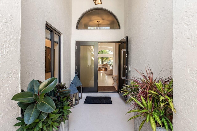 1175 Sea Grape Cir, Delray Beach, FL 33445 - doorway to property featuring stucco siding