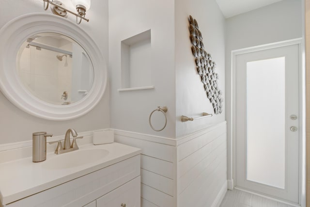 bathroom featuring wainscoting and vanity