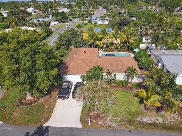 view of property location with a pool