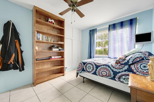1401 Shore Dr, Lake Clarke Shores, FL 33406 - bedroom with light tile patterned flooring and a ceiling fan