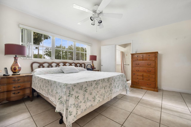 1401 Shore Dr, Lake Clarke Shores, FL 33406 - bedroom with light tile patterned floors and ceiling fan