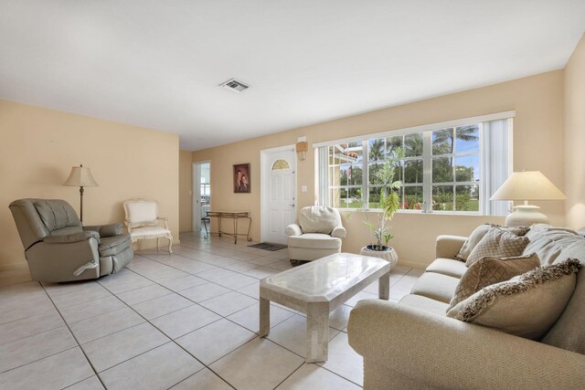 1401 Shore Dr, Lake Clarke Shores, FL 33406 - living area featuring light tile patterned flooring