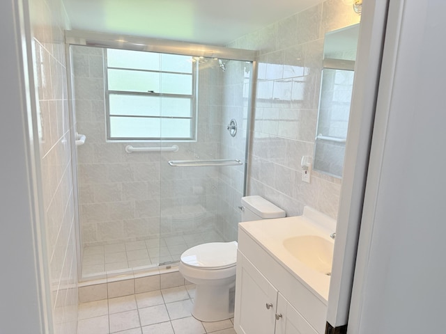 1036 Hythe B B, Boca Raton, FL 33434 - full bath featuring a stall shower, tile walls, vanity, and tile patterned flooring