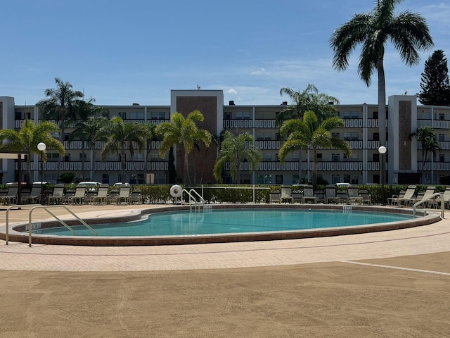 community pool featuring a patio