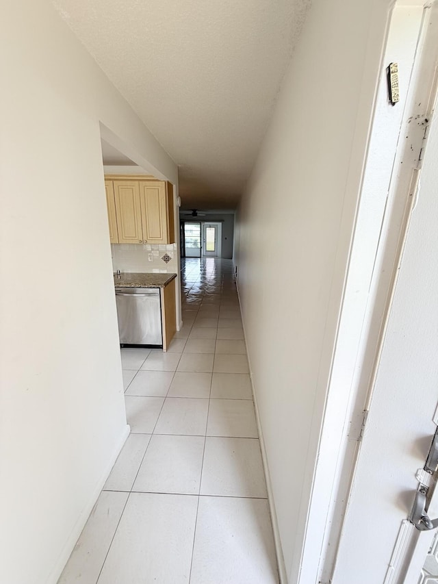 1036 Hythe B B, Boca Raton, FL 33434 - hall with light tile patterned floors and baseboards