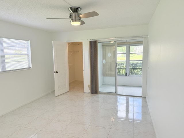 1036 Hythe B B, Boca Raton, FL 33434 - spare room with plenty of natural light and ceiling fan