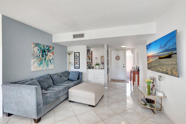 903 Bridgewood Pl, Boca Raton, FL 33434 - living room with a textured ceiling and light tile patterned flooring