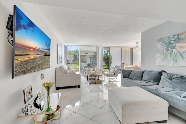 903 Bridgewood Pl, Boca Raton, FL 33434 - living room with light tile patterned flooring and a textured ceiling